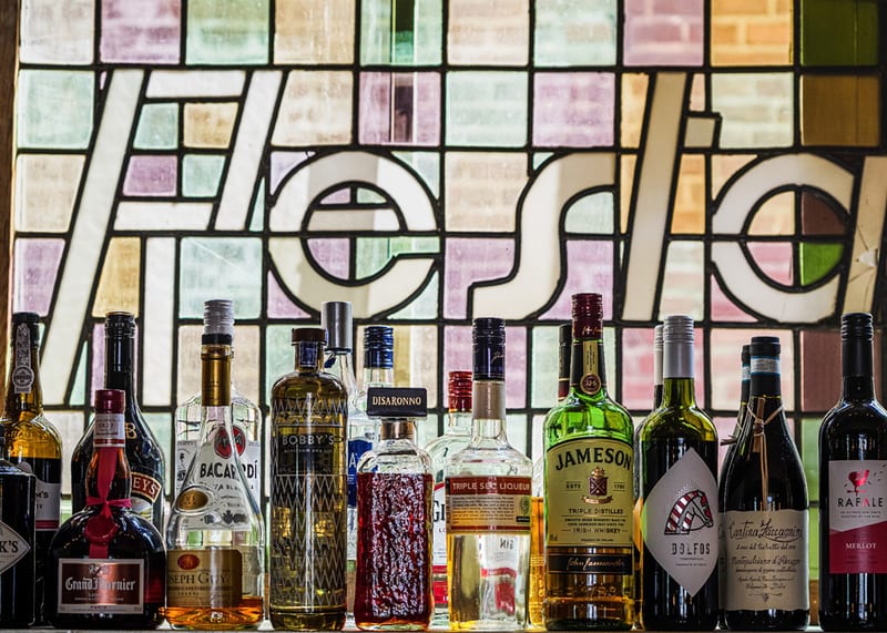 Bottles behind the leaded glass window