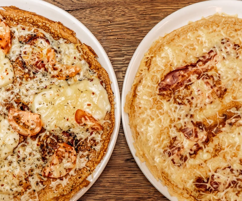 Two Hendrik Amsterdam pancakes on the wooden table