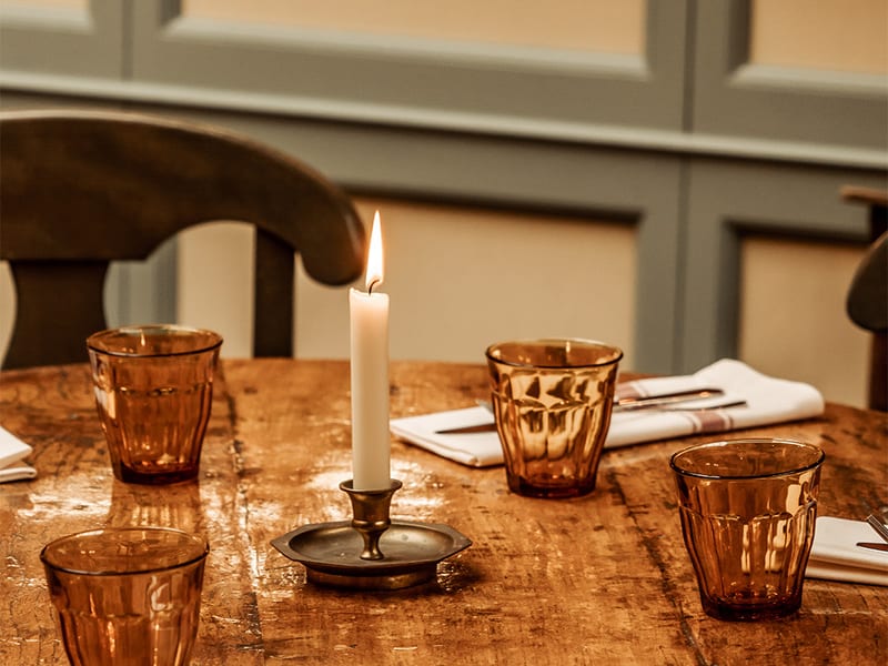 The deep red room by candlelight