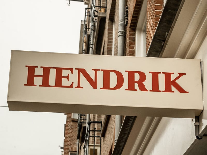 The HENDRIK sign hanging over the Ruysdaelstraat